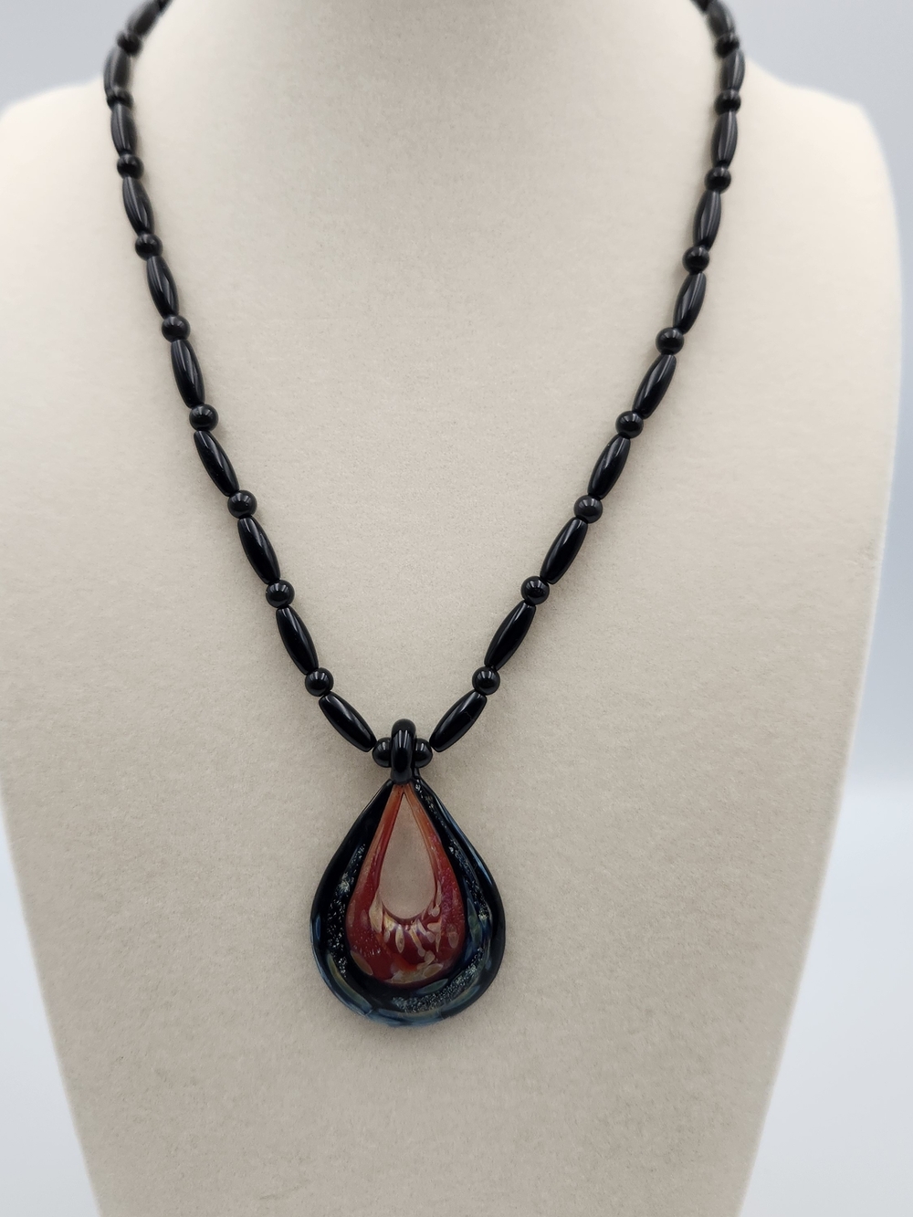 Handcrafted Black Glass Bead Necklace with Red Glass Teardrop Pendant